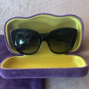 Gucci Black Cat-Eye Sunglasses with Yellow-Lined Purple Case